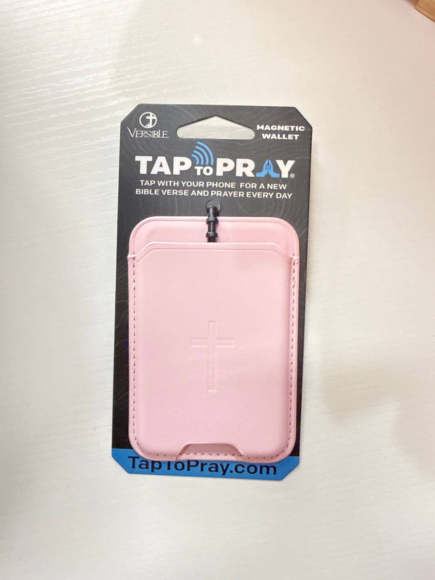 Magnetic wallets tap to pray