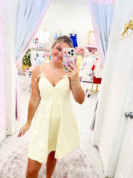Butter, yellow bow, mini dress
