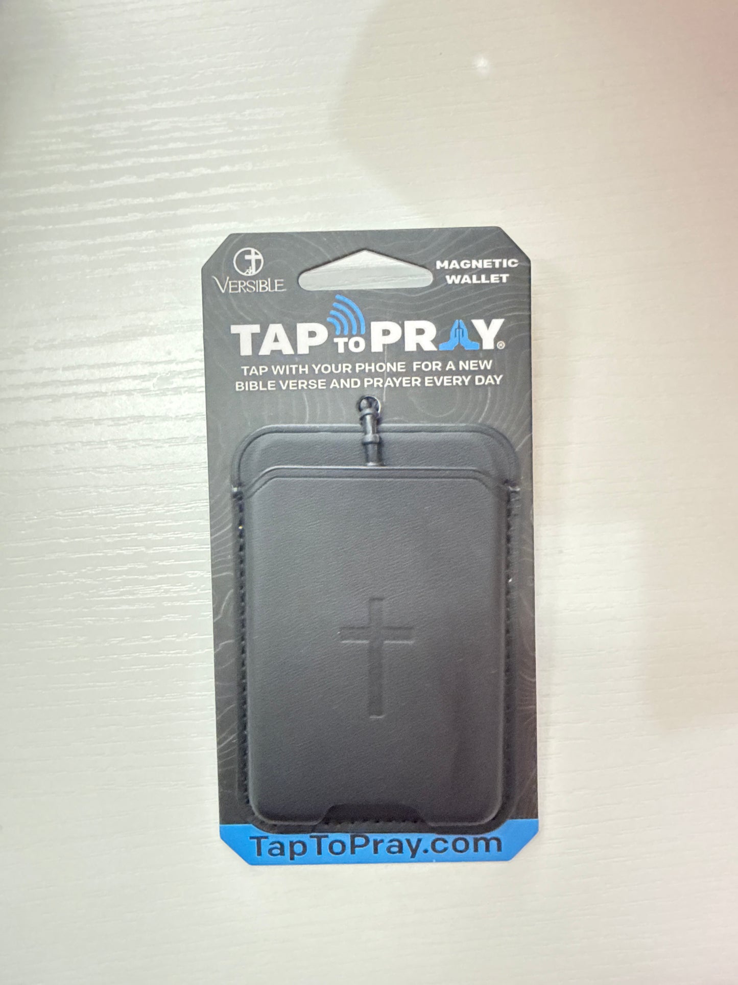 Magnetic wallets tap to pray