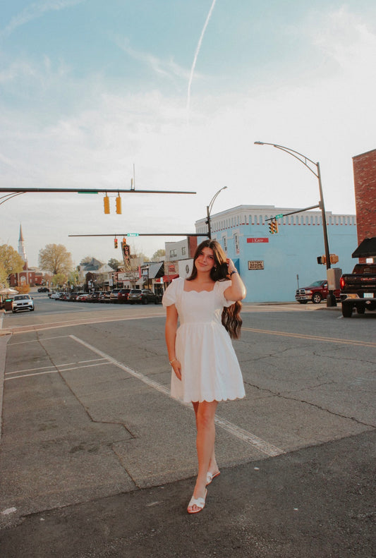 Scalloped white mini dress
