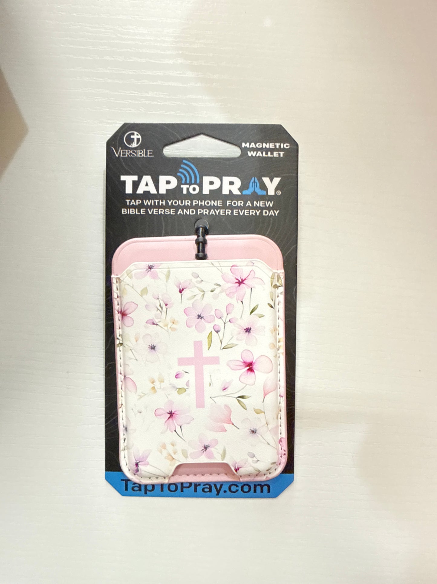 Magnetic wallets tap to pray
