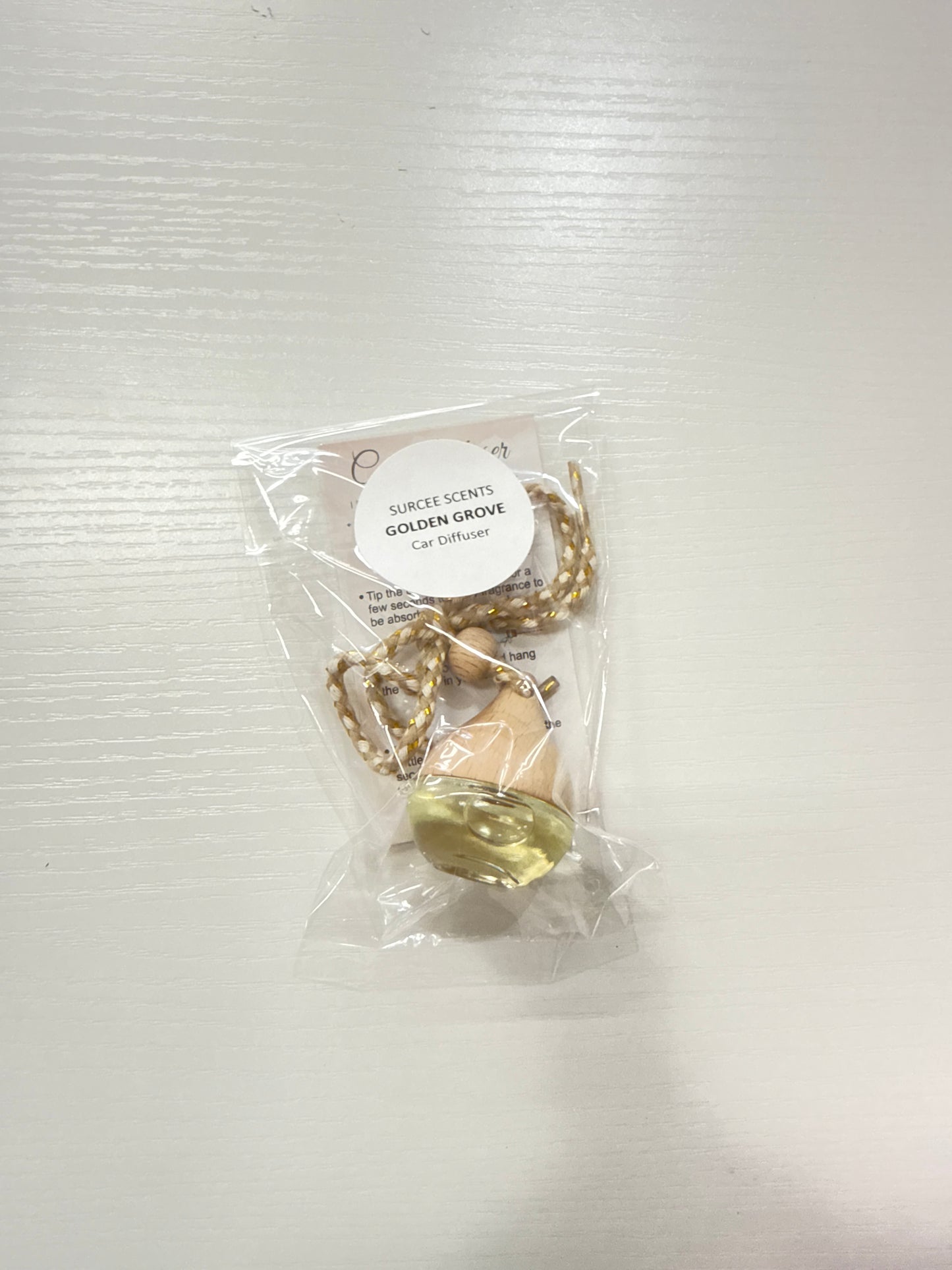 Golden grove hanging car diffuser