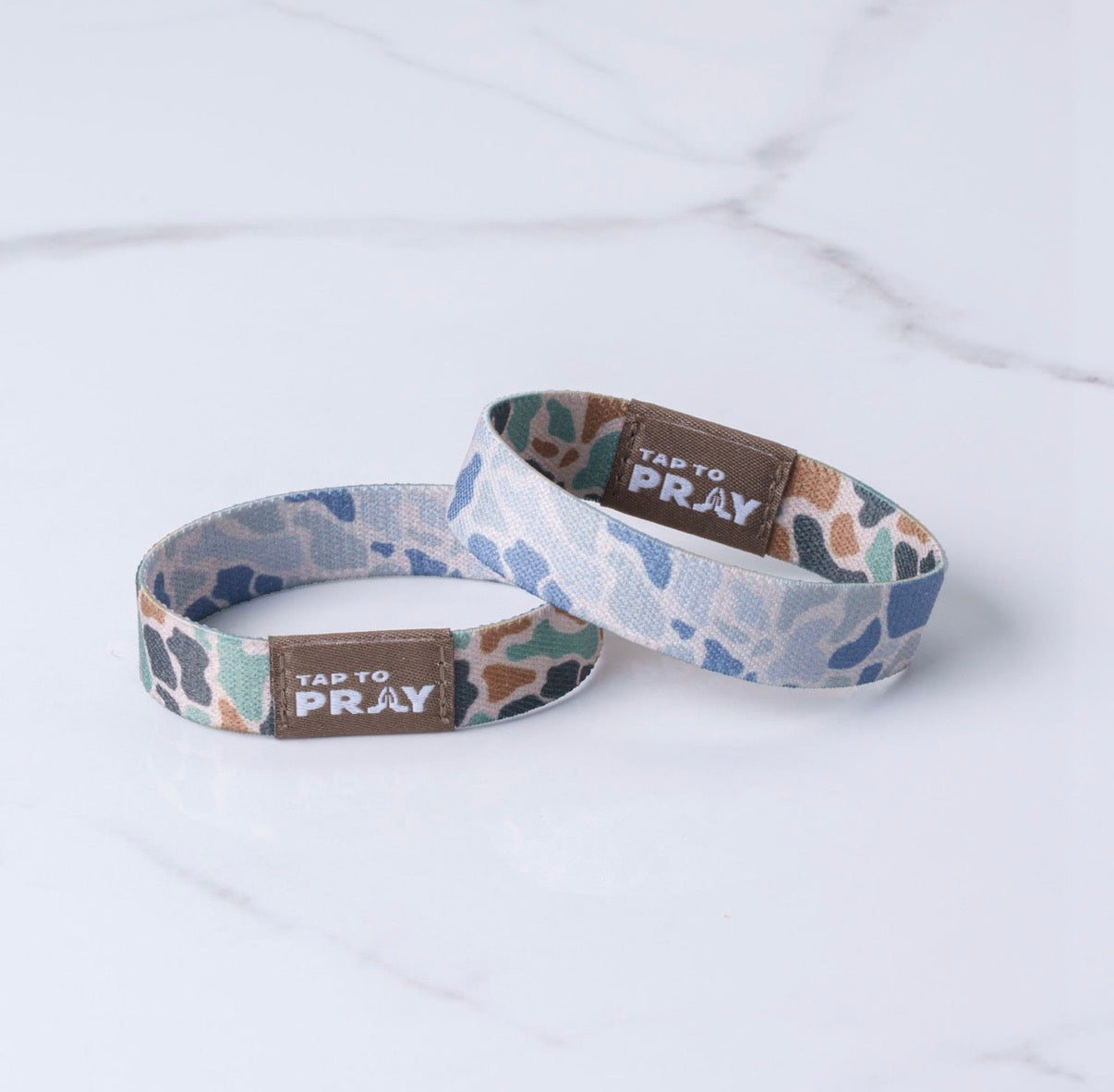 Classic and sage camo tap to pray
