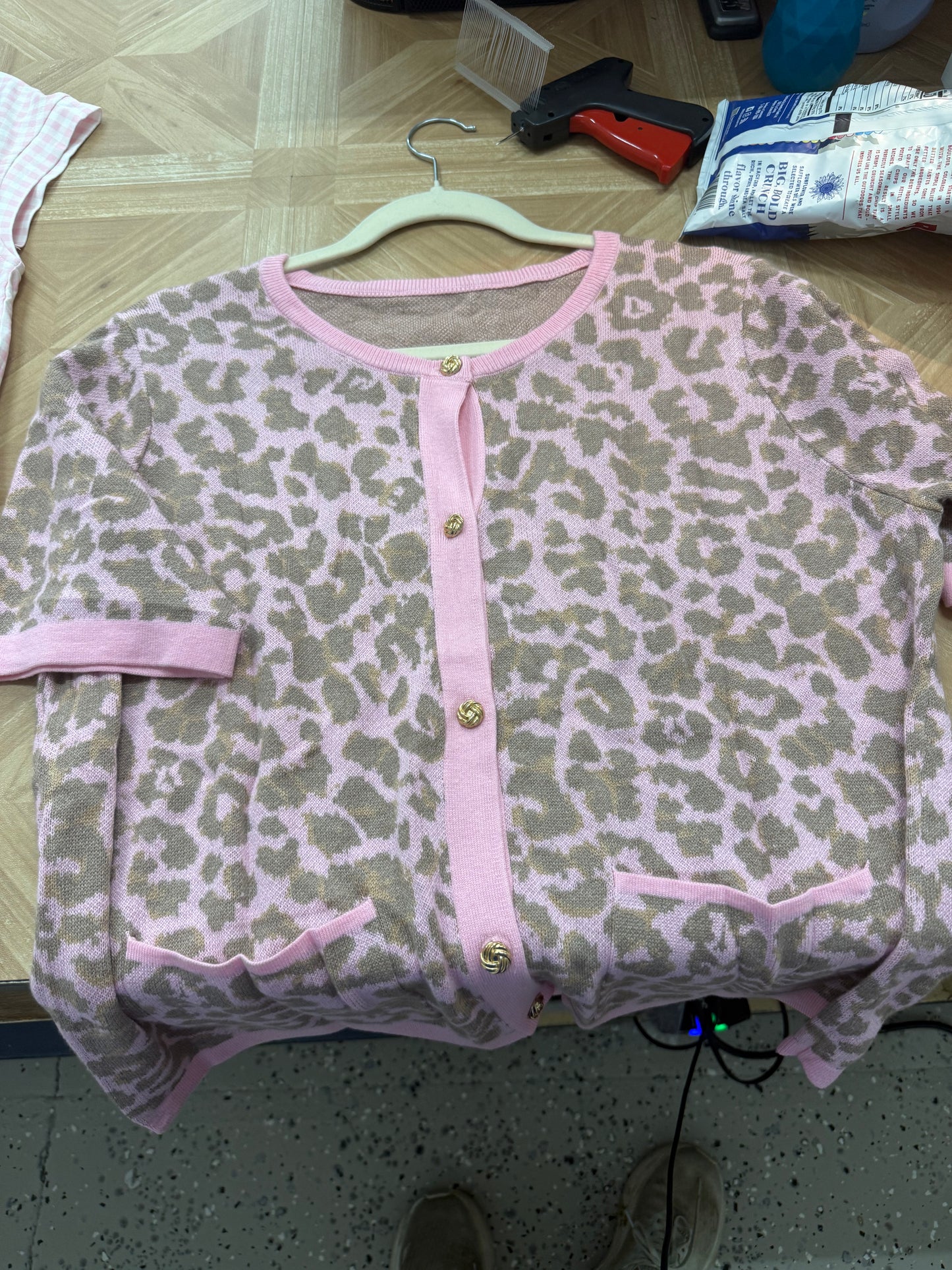 Pink leopard print button down top